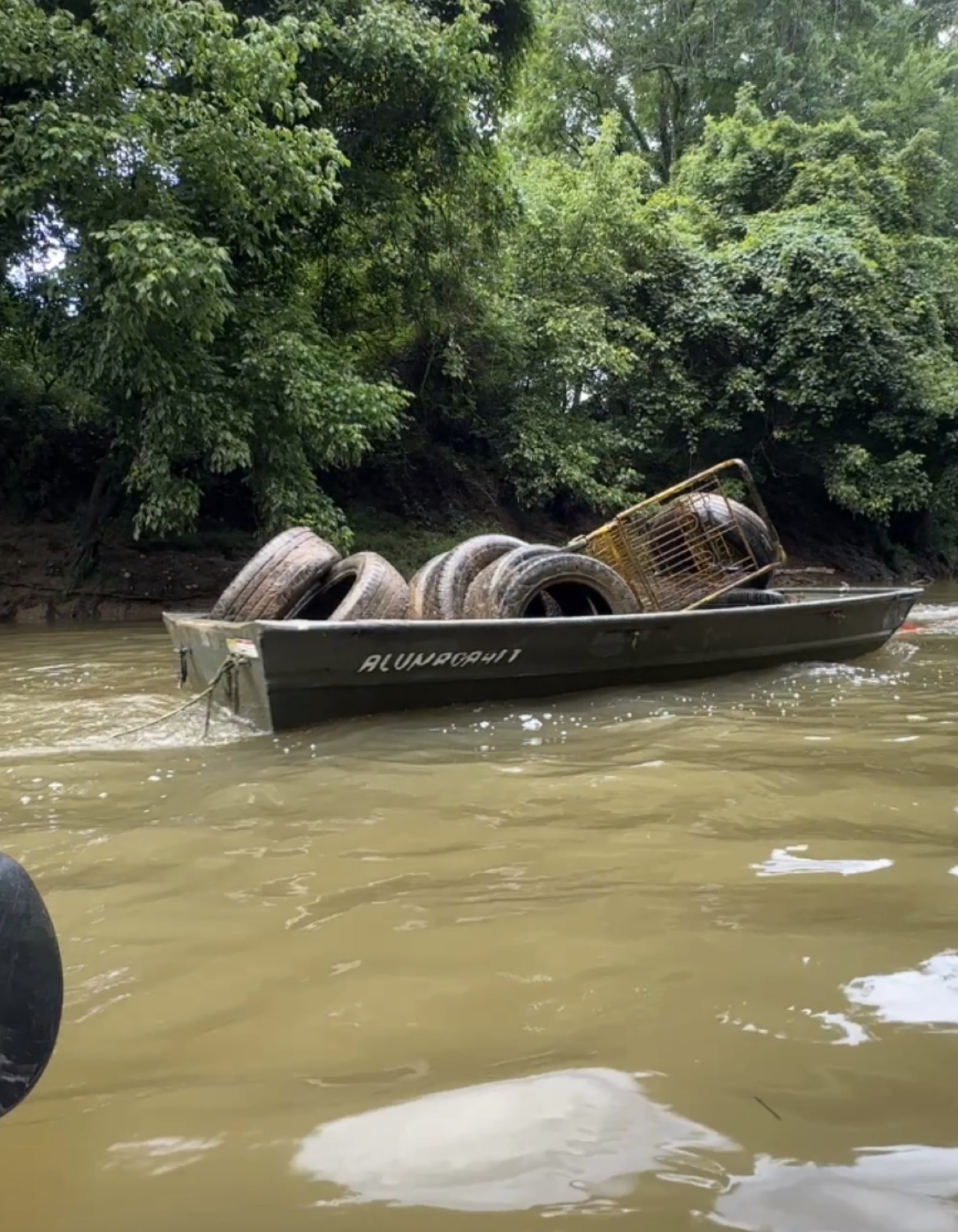 Field crew working from a boat on the Little Sandy River